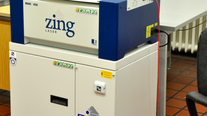 The "Zing" laser engraver, with the filtration unit underneath.